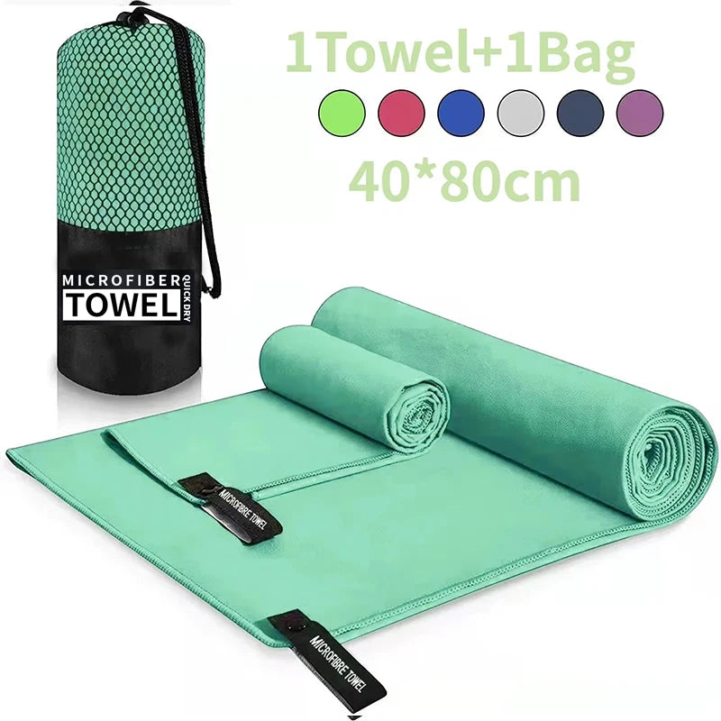 Quick drying sports towel in green microfiber with compact carrying bag 40 by 80 centimeters