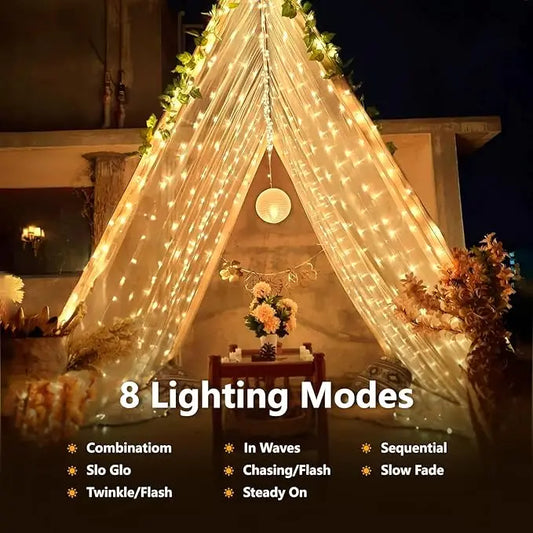 Outdoor solar fairy lights draped over a cozy tent setup with warm white glowing lights at night