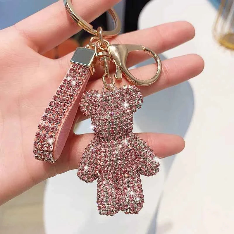 Sparkling pink rhinestone bear keychain with matching rhinestone strap and gold hardware