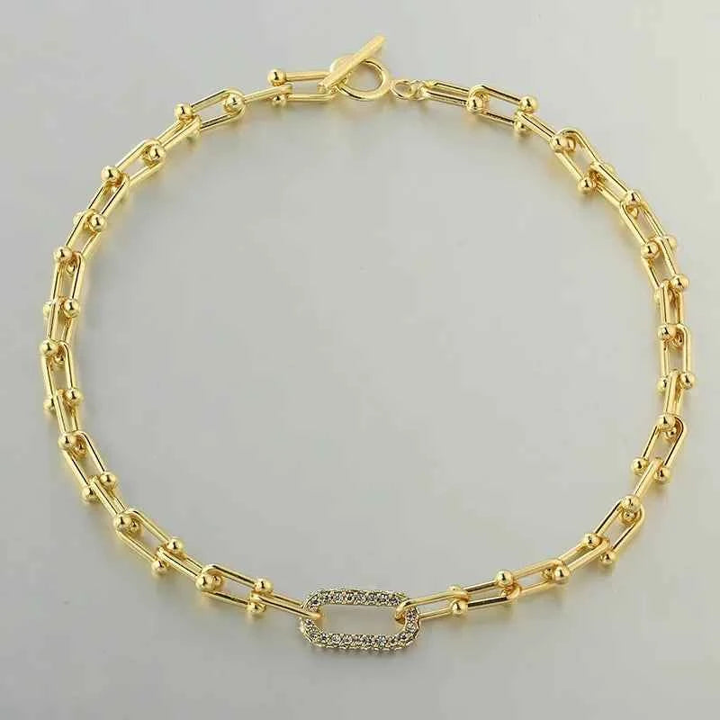 Round-shaped diamond-encrusted necklace