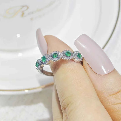 Green zircon eternity Rings