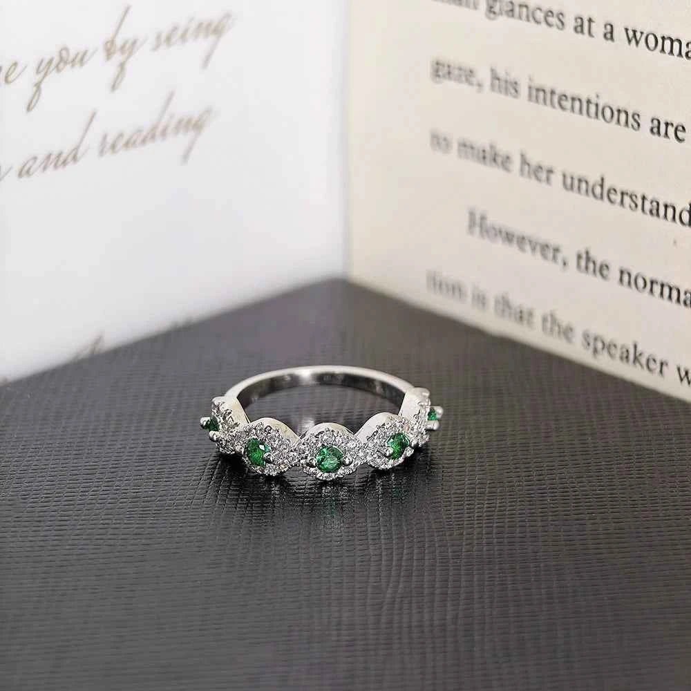 Green zircon eternity Rings