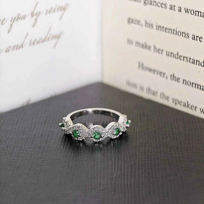 Green zircon eternity Rings