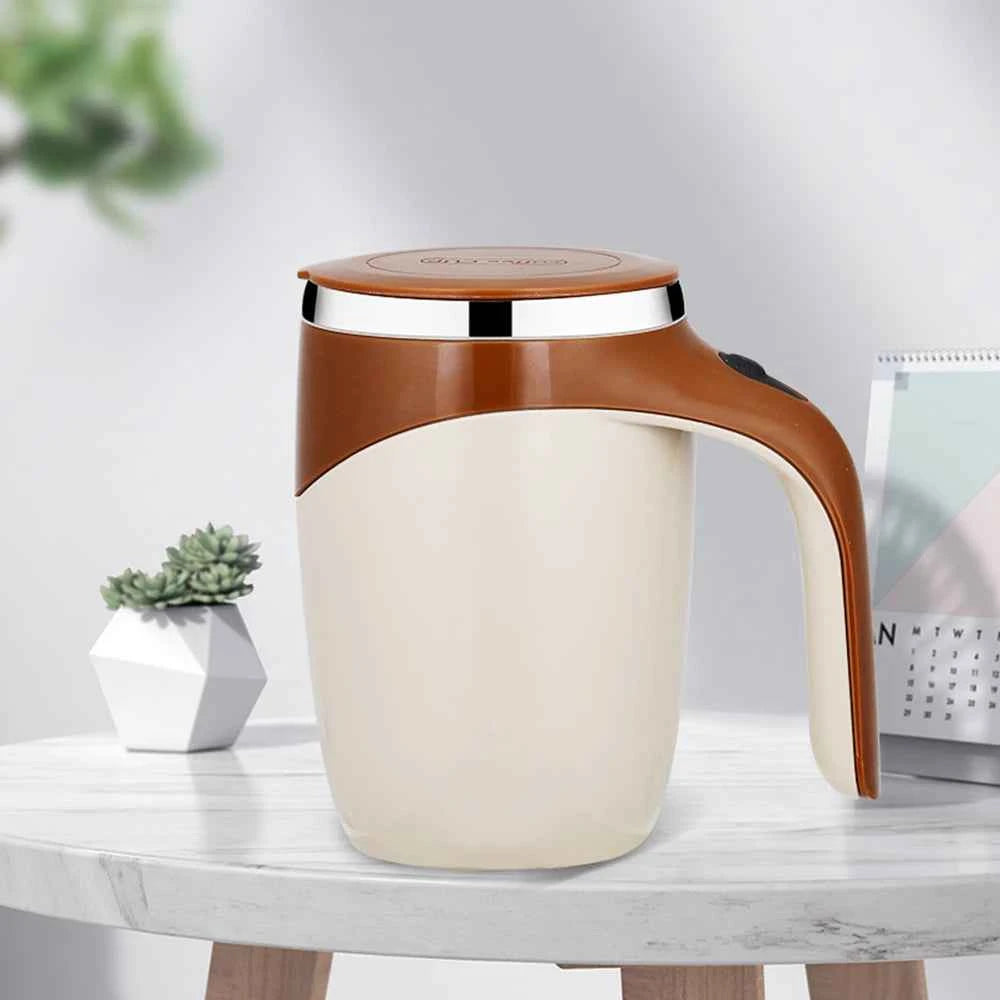 DFShop automatic self stirring coffee mug with brown lid and handle on a marble table
