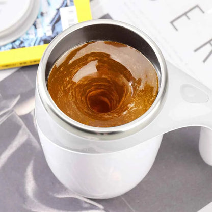 White automatic self stirring coffee mug by DFShop with swirling coffee inside