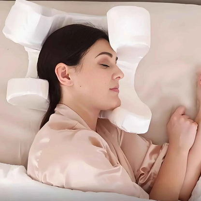 Woman sleeping comfortably using a white anti wrinkle sleep pillow for facial support from DFShop