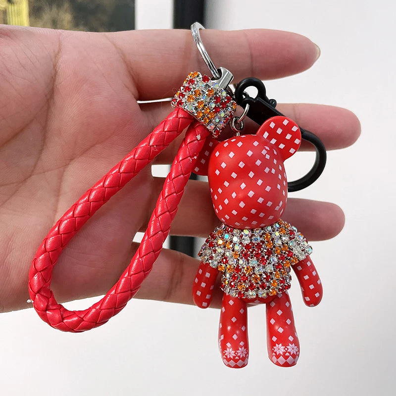 Cute rhinestone bear keychain with red braided strap and colorful rhinestone decoration