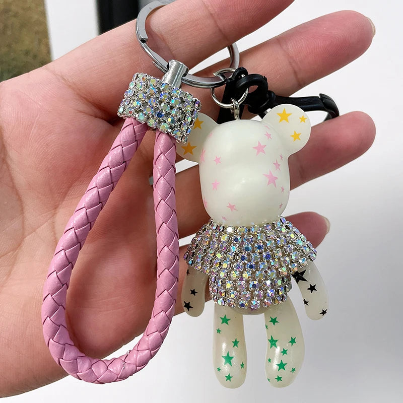Cute rhinestone bear keychain with colorful star patterns and pink braided strap from DFShop