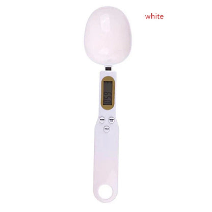 White digital measuring spoon scale with LCD display and control buttons for precise ingredient measurement