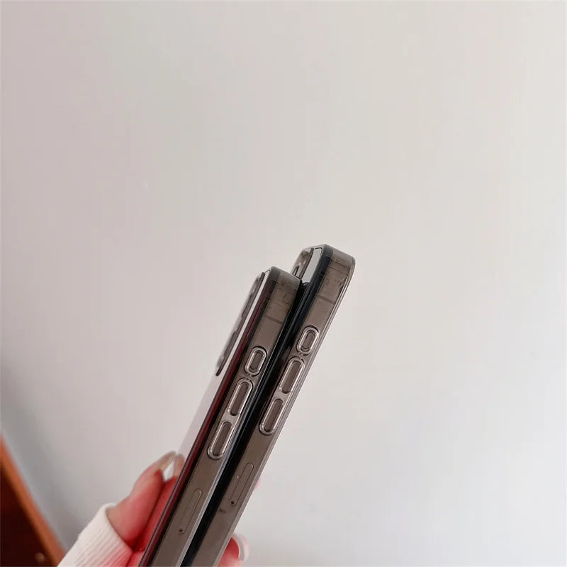 Two iPhones held side by side with luminous sand iPhone case showing protective edges and buttons