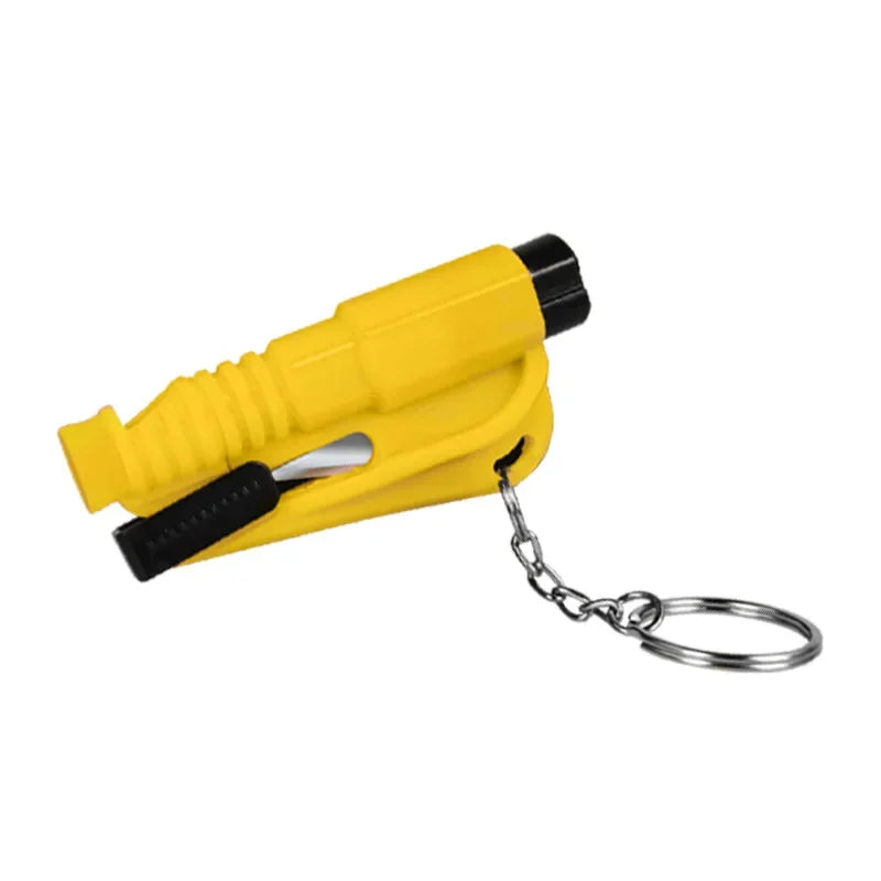 Yellow keychain safety hammer with metal ring for emergency glass breaking and seatbelt cutting
