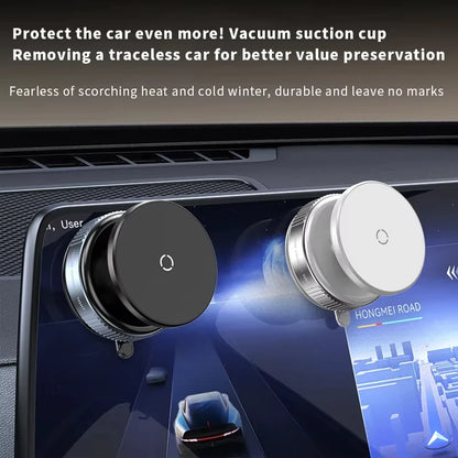 Black and silver magnetic car phone holder with vacuum suction cup mounted on car dashboard