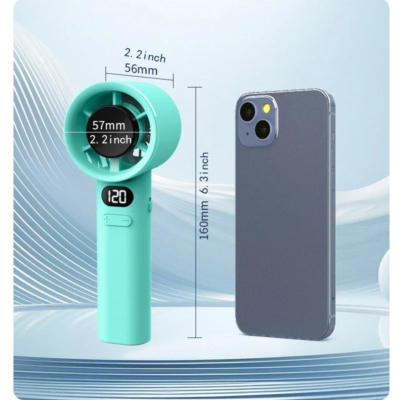 Compact portable bladeless hand fan in turquoise with digital display next to a smartphone for size comparison