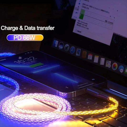 RGB USB C fast charging cable glowing on laptop keyboard with phone charging at 66W PD power