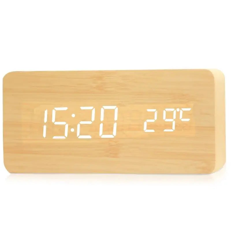 Wooden digital alarm clock displaying time and temperature with a natural wood finish