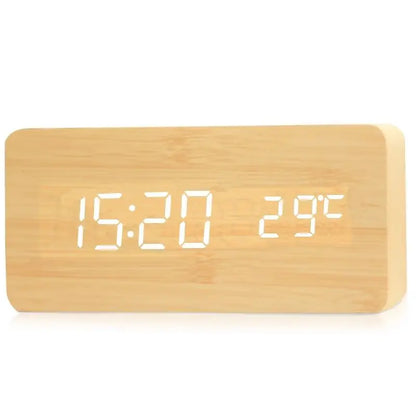 Wooden digital alarm clock displaying time and temperature with a natural wood finish